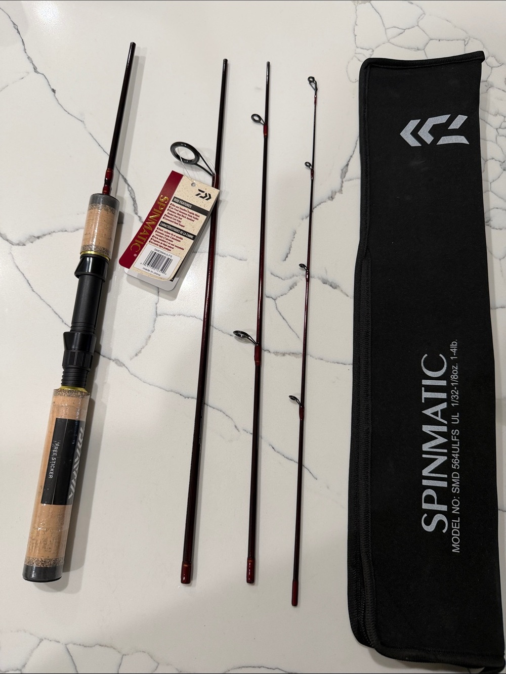 Daiwa Spinmatic Black and Dark Red Travel Spinning Rod
